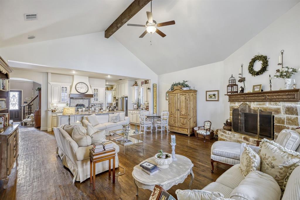 1425 Wildrye Ridge Celina, TX 75009 - Photo 15 of 32 a living room with furniture kitchen view and a chandelier