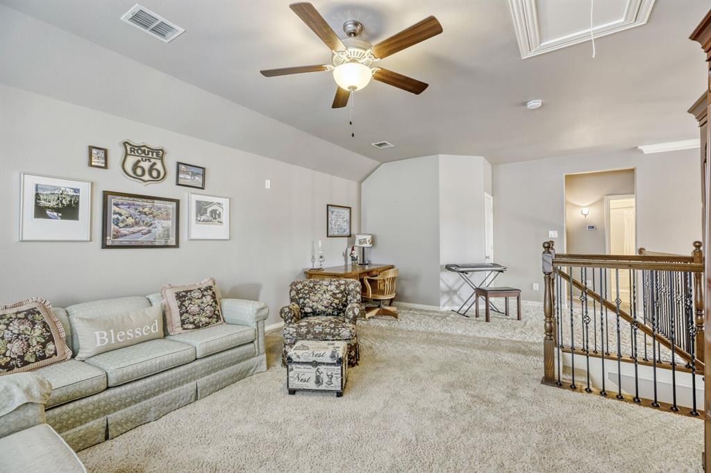 1425 Wildrye Ridge Celina, TX 75009 - Photo 22 of 32 a living room with furniture