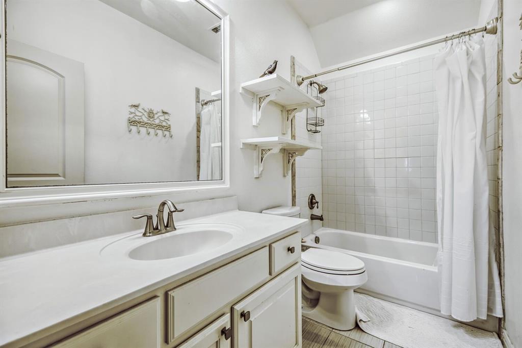 1425 Wildrye Ridge Celina, TX 75009 - Photo 24 of 32 a bathroom with a sink toilet tub and shower