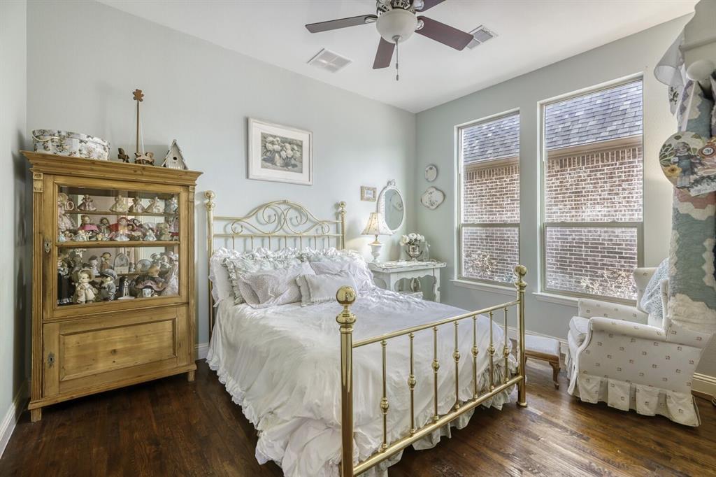 1425 Wildrye Ridge Celina, TX 75009 - Photo 8 of 32 a bedroom with a bed and a window