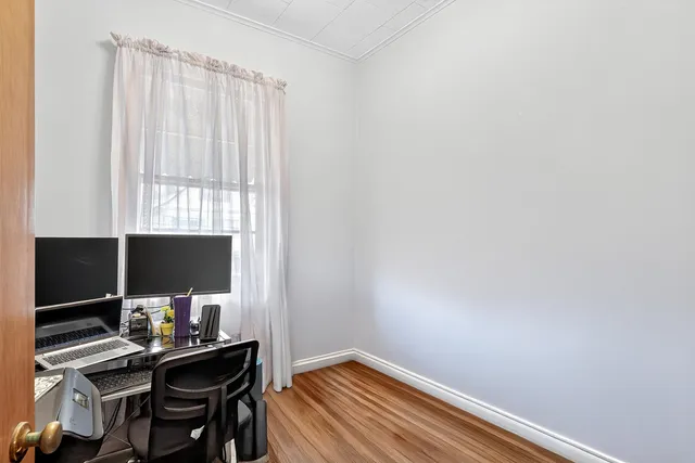 a workspace with furniture and lamp