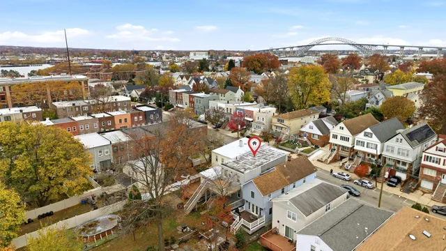 an aerial view of a city with lots of residential buildings