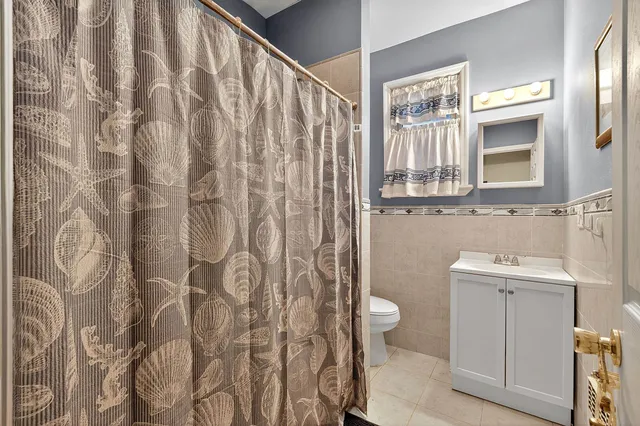 a bathroom with a sink and toilet