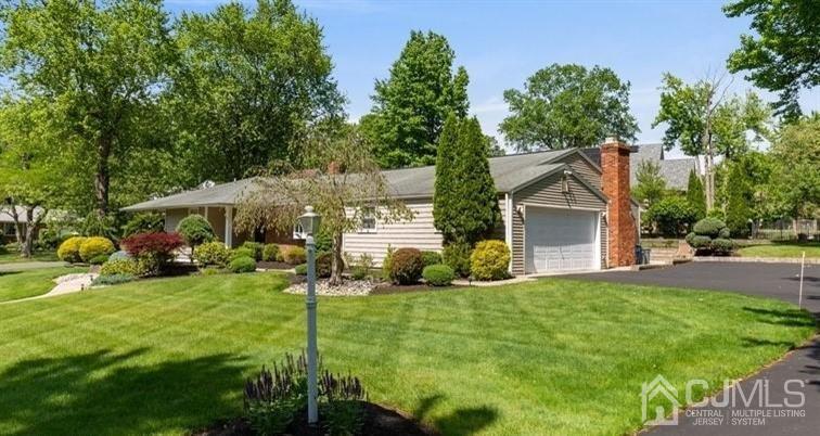33 Southfield Road Edison, NJ 08820 - Photo 2 of 36 a view of a house with a yard