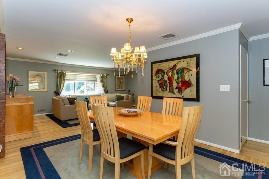 33 Southfield Road Edison, NJ 08820 - Photo 16 of 36 a dining room with furniture and window