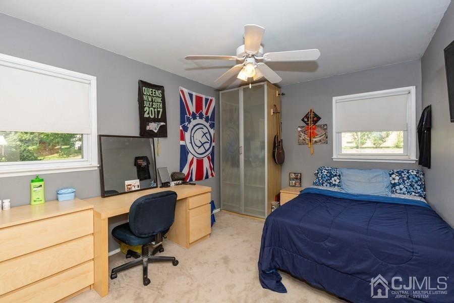 33 Southfield Road Edison, NJ 08820 - Photo 22 of 36 a bedroom with a bed and a window