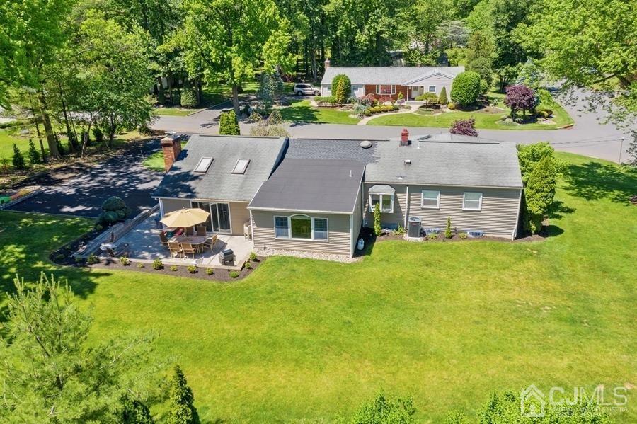 33 Southfield Road Edison, NJ 08820 - Photo 29 of 36 an aerial view of a house with swimming pool a yard and a large tree