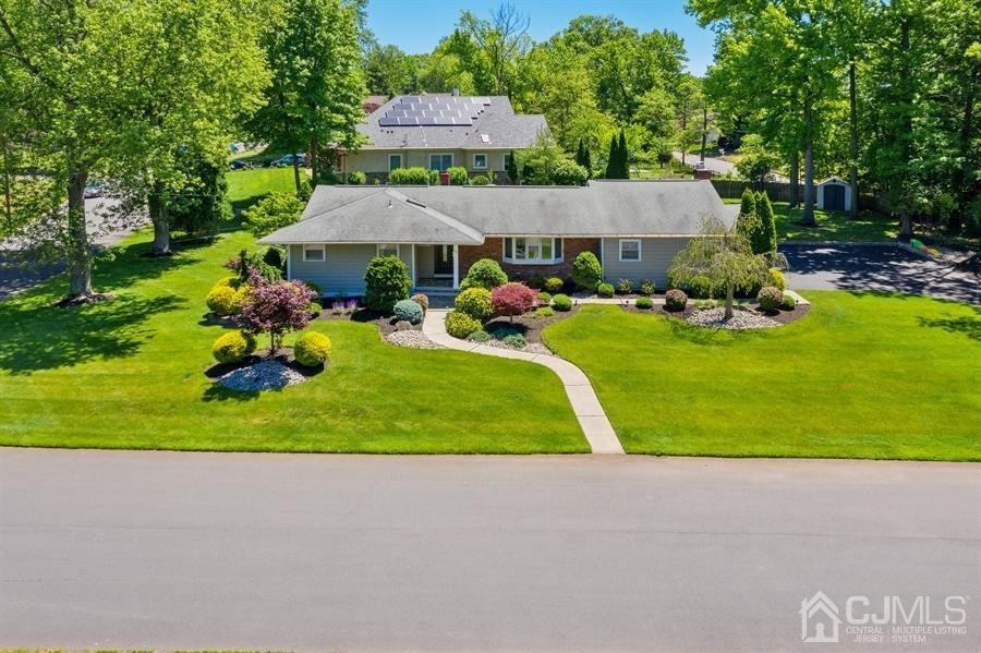 33 Southfield Road Edison, NJ 08820 - Photo 33 of 36 a view of a house with backyard and garden