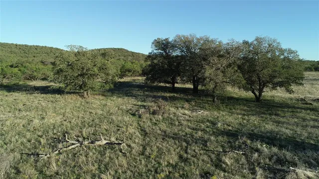 a view of outdoor space and green field