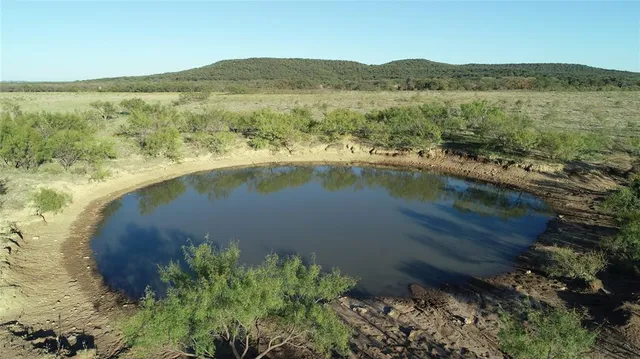 a view of lake with mountain