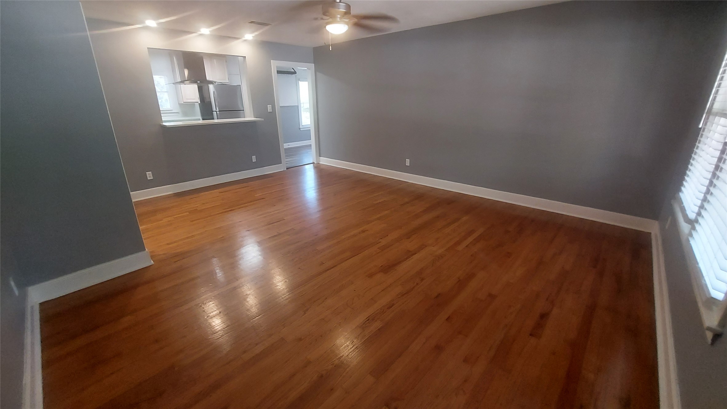 1411 Ruth Avenue Austin, TX 78757 - Photo 13 of 26 LIVING WITH HARDWOOD FLOORS