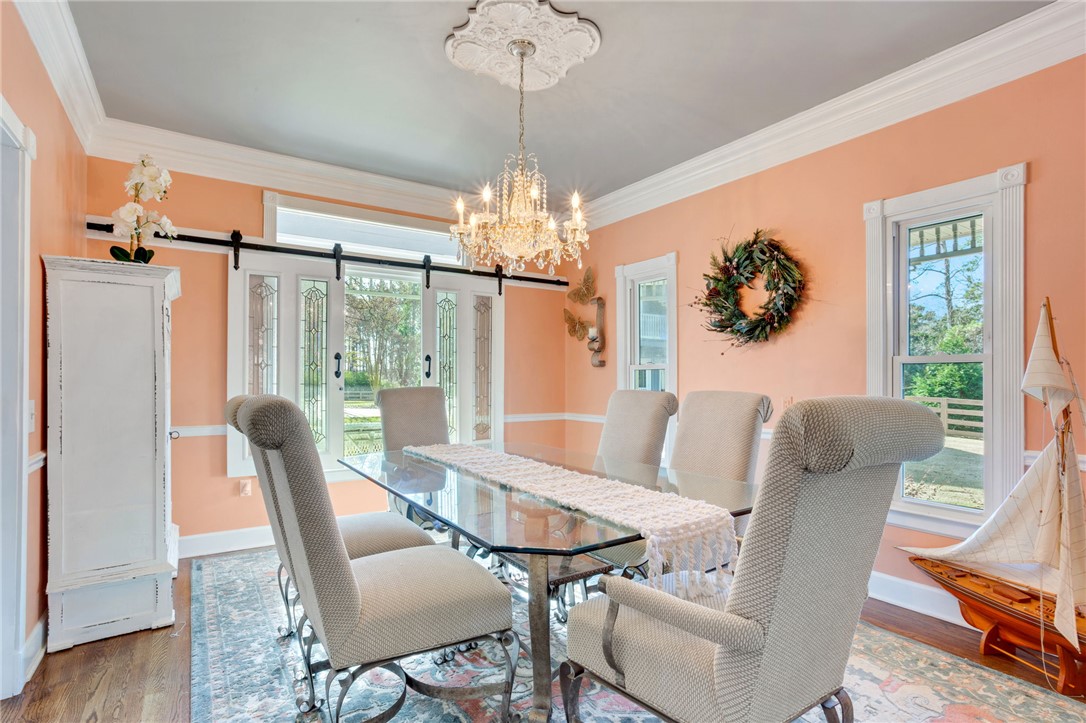 1133 Elrod Ferry Road Hartwell, GA 30643 - Photo 8 of 46 This elegant dining room features hardwood floors and ample natural light.