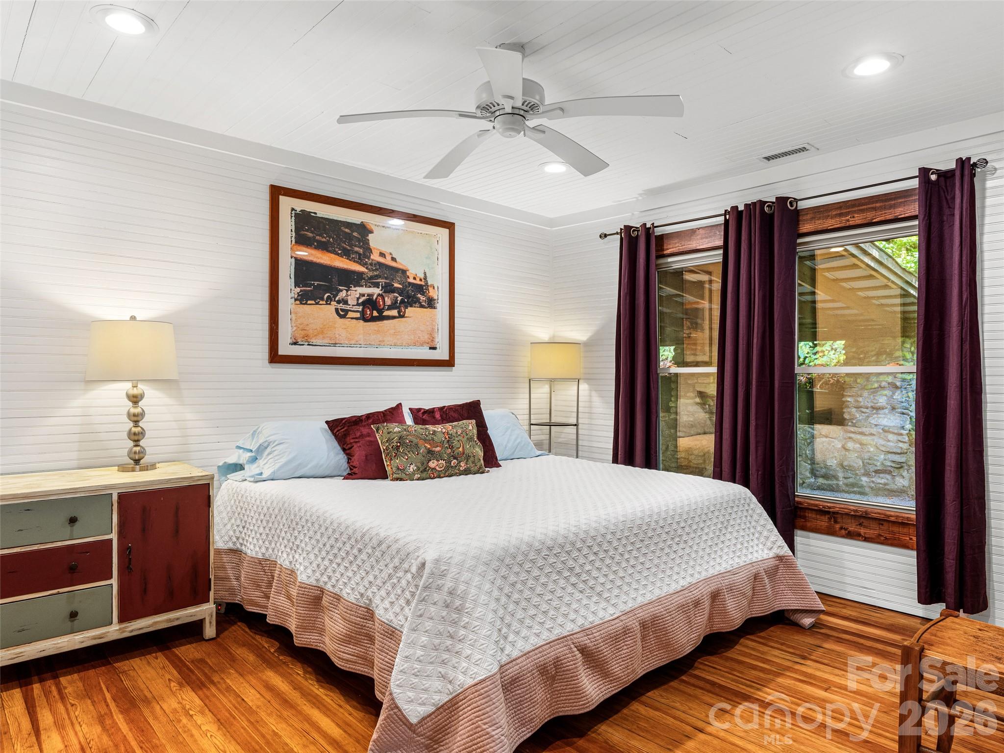 206 Chestnut Hill Road Gerton, NC 28735 - Photo 27 of 48 a bedroom with a large bed and a window