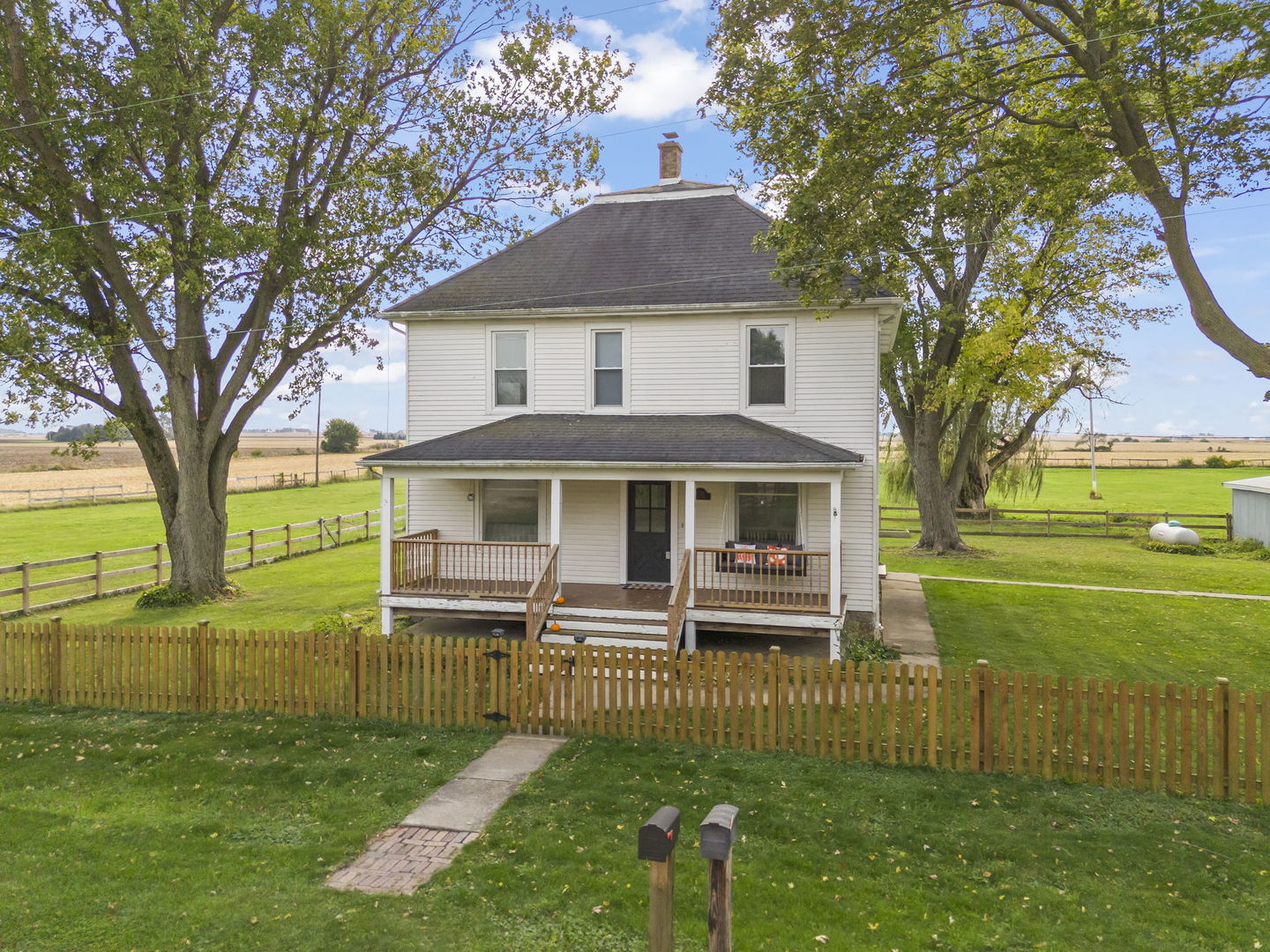 17128 Lukens Road Sycamore, IL 60178 - Photo 1 of 45 a front view of a house with a yard