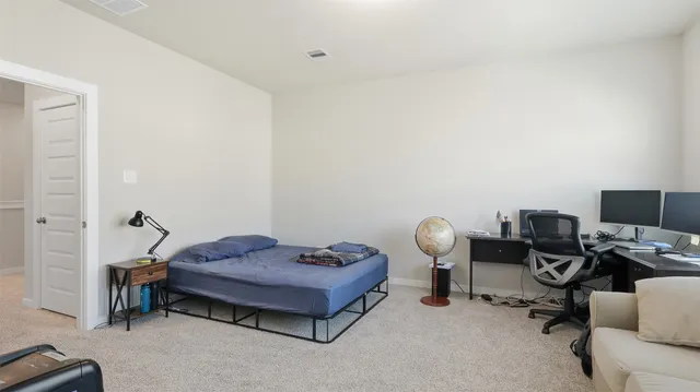 a bedroom with furniture