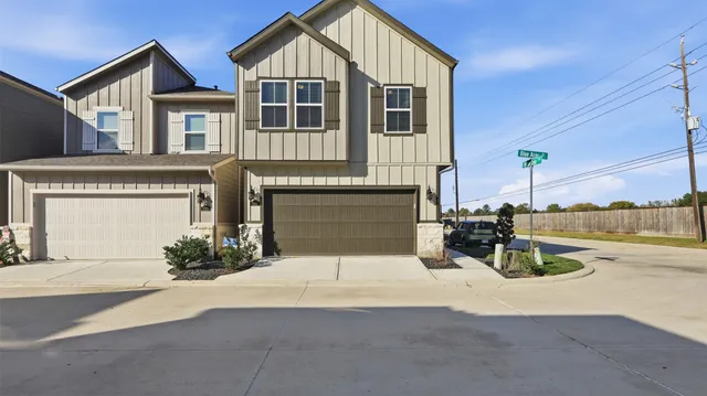 a front view of a house with yard