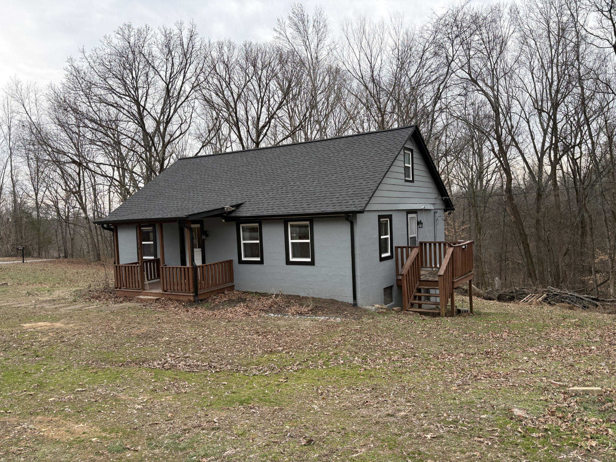 1546 Bobby Road Clarksville, TN 37040 - Photo 1 of 21 a house with trees in the background