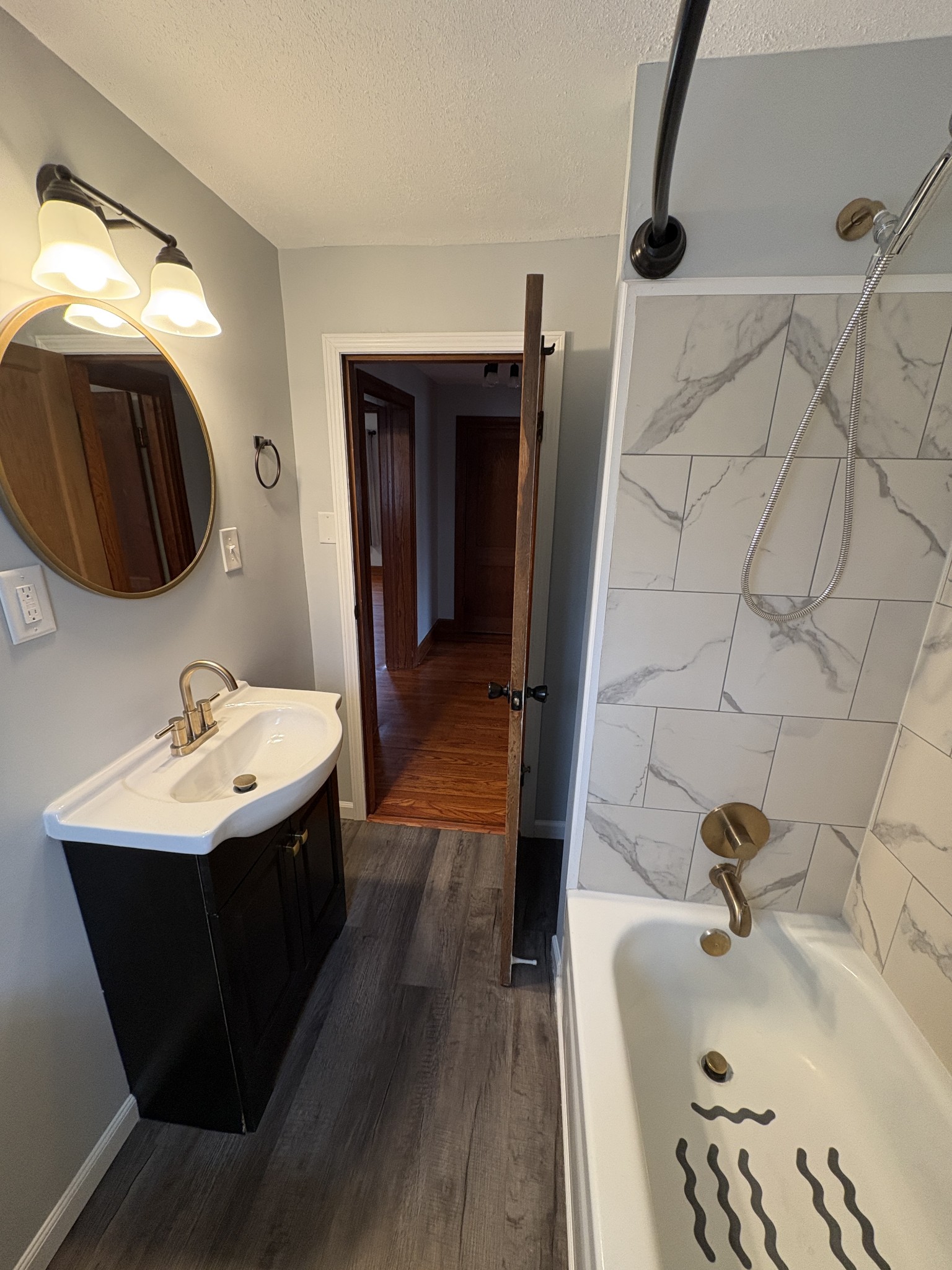 1546 Bobby Road Clarksville, TN 37040 - Photo 12 of 21 a bathroom with a sink and mirror