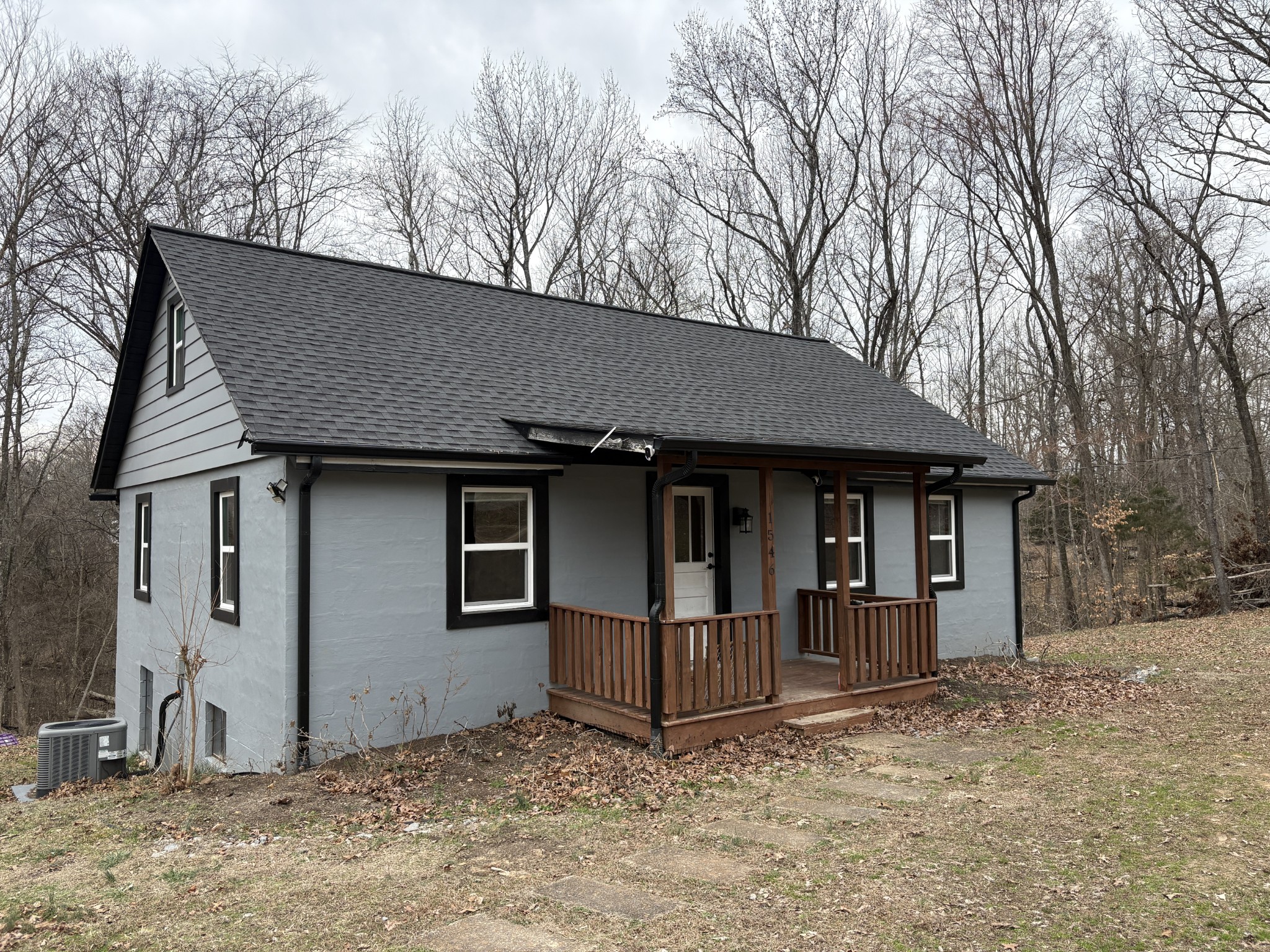 1546 Bobby Road Clarksville, TN 37040 - Photo 2 of 21 a house with trees in the background