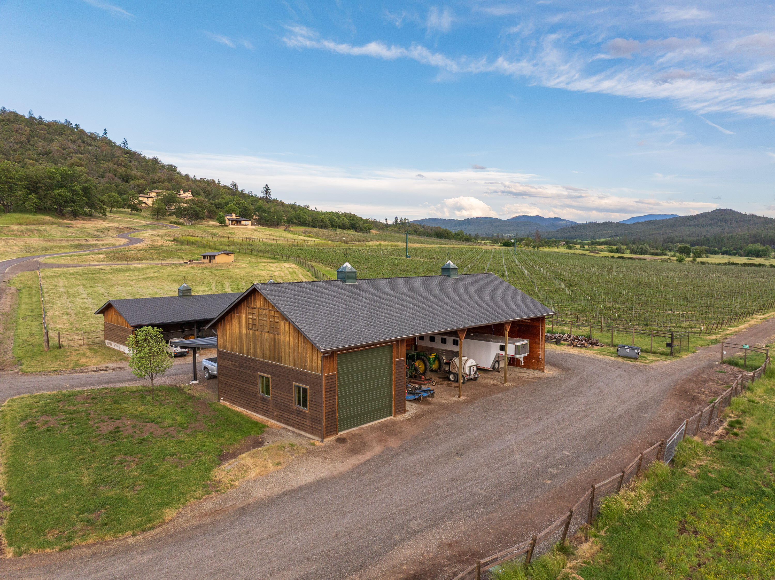 766 Meridian Road Eagle Point, OR 97524 - Photo 60 of 66 an aerial view of a house with a garden and lake view