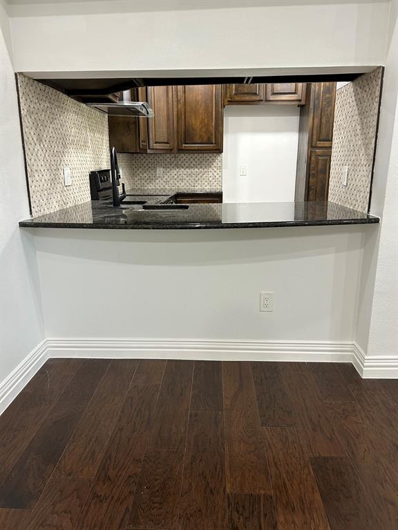 8545 Midpark Road, Unit 10 Dallas, TX 75240 - Photo 11 of 31 a view of entryway with wooden floor