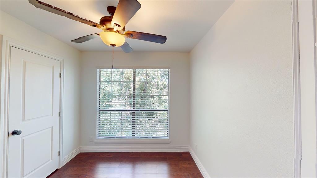 8545 Midpark Road, Unit 10 Dallas, TX 75240 - Photo 24 of 31 a view of an empty room with a window