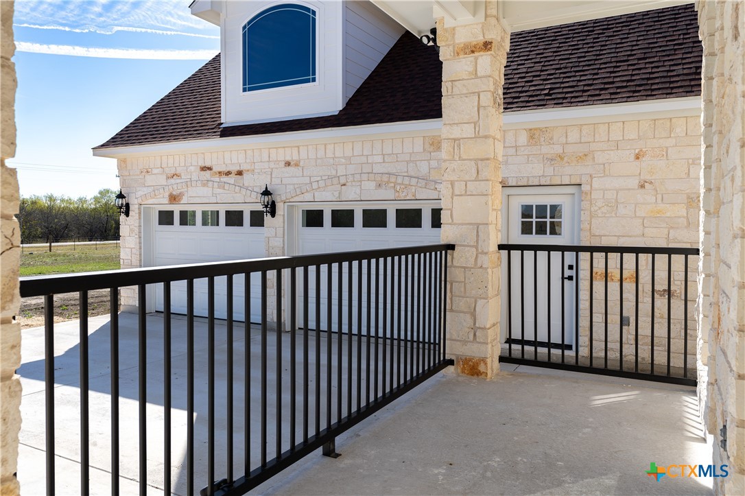 1000 Black Ankle Road Lockhart, TX 78644 - Photo 32 of 40 a view of a balcony with wooden fence