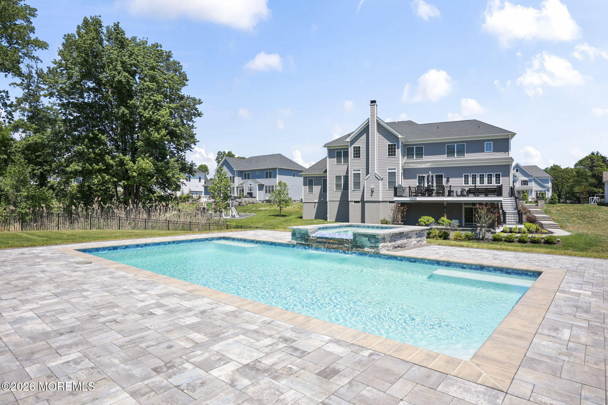 66 Windermere Road Lincroft, NJ 07738 - Photo 34 of 48 a view of swimming pool with outdoor seating and a yard