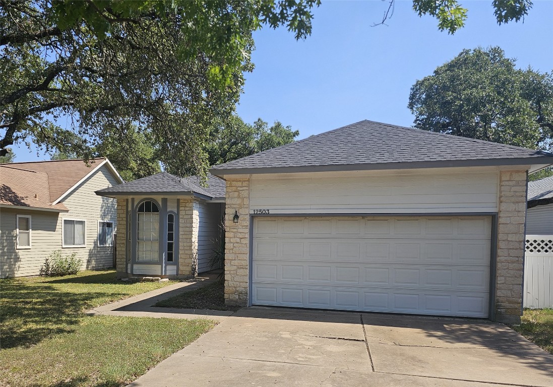 12503 Deer Falls Drive Austin, TX 78729 - Photo 2 of 26 2-Car Garage