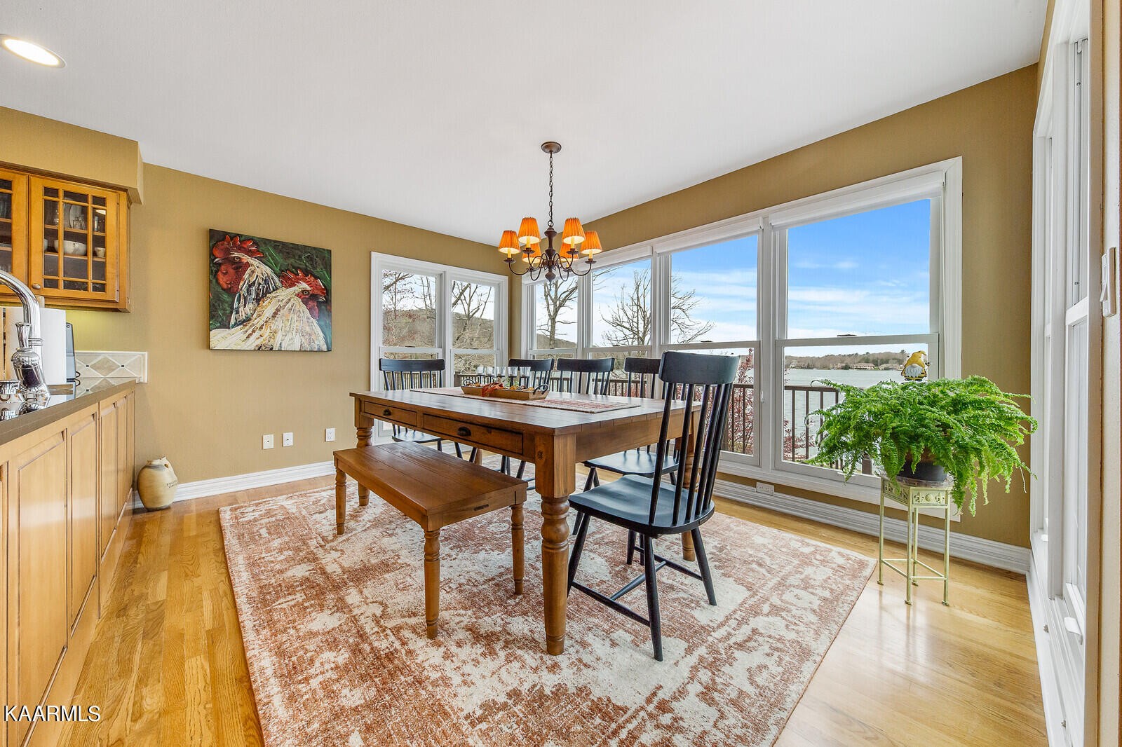 16 Milnor Circle Crossville, TN 38558 - Photo 15 of 50 a dining room with furniture a rug and a chandelier