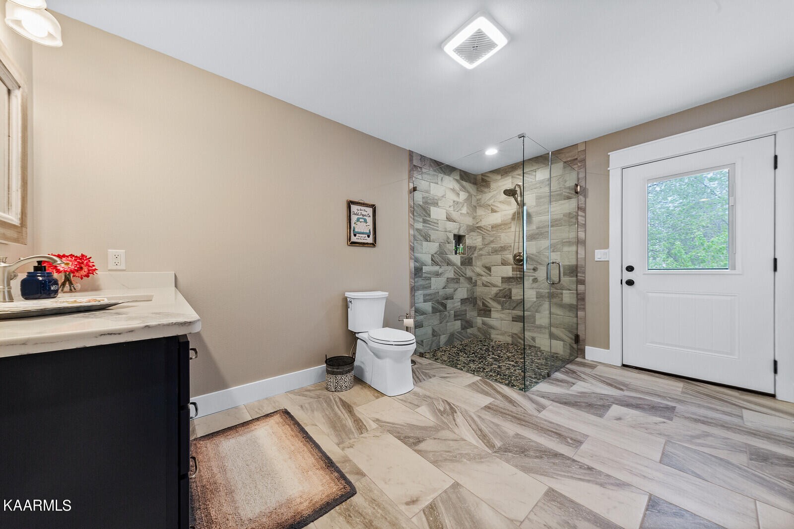 16 Milnor Circle Crossville, TN 38558 - Photo 29 of 50 a bathroom with a sink toilet and shower