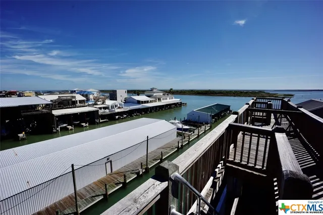 a view of livingroom with furniture and windows