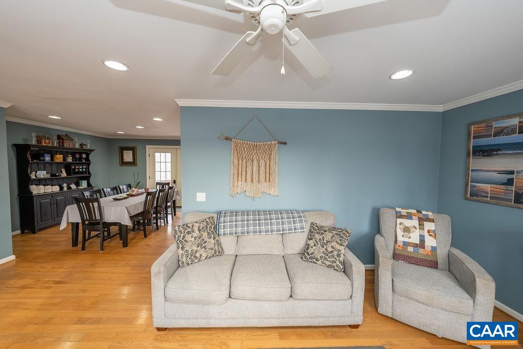1425 Jacks Shop Road Rochelle, VA 22738 - Photo 11 of 66 a living room with furniture and a chandelier