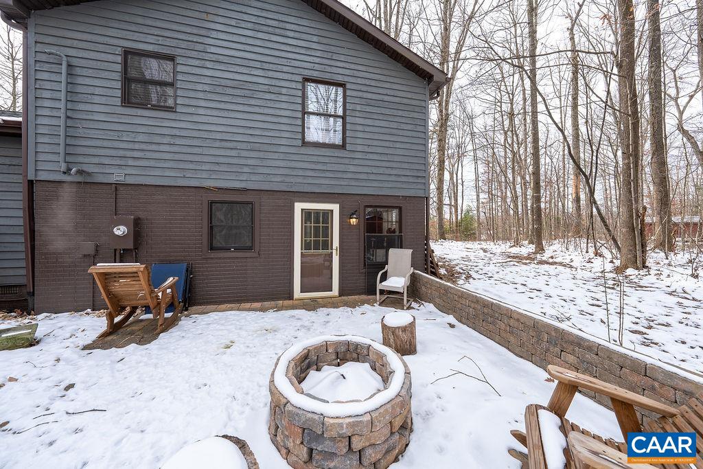 1425 Jacks Shop Road Rochelle, VA 22738 - Photo 12 of 66 a front view of a house with a yard and sitting area