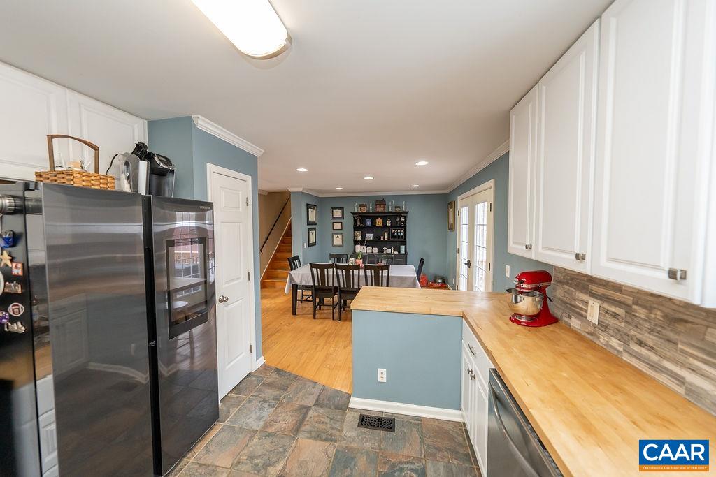 1425 Jacks Shop Road Rochelle, VA 22738 - Photo 20 of 66 a kitchen with stainless steel appliances granite countertop a refrigerator and a sink
