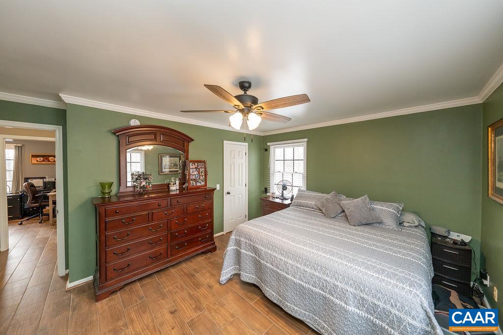 1425 Jacks Shop Road Rochelle, VA 22738 - Photo 29 of 66 a bedroom with a bed and a dresser