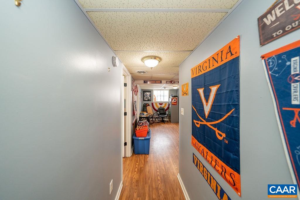 1425 Jacks Shop Road Rochelle, VA 22738 - Photo 37 of 66 a view of a livingroom with wooden floor and stairs