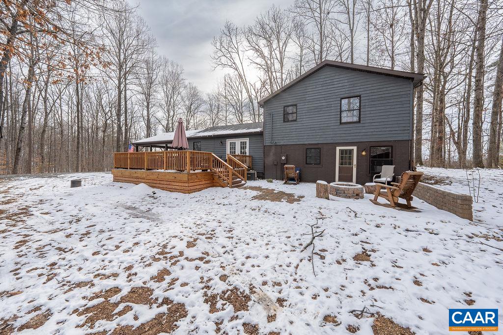 1425 Jacks Shop Road Rochelle, VA 22738 - Photo 54 of 66 a view of a chairs and fire pit in the patio