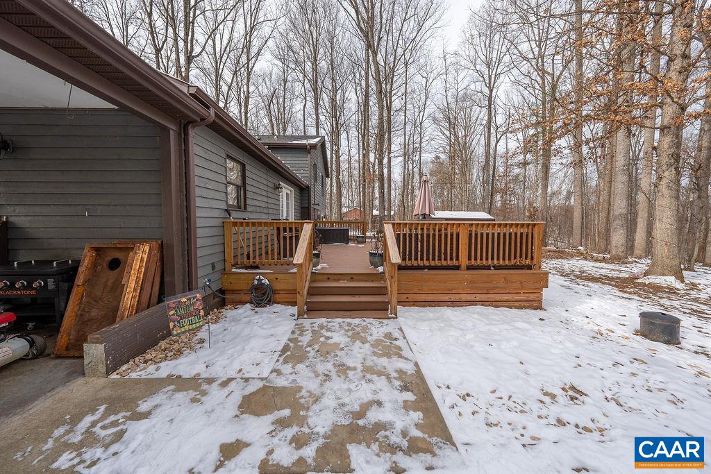 1425 Jacks Shop Road Rochelle, VA 22738 - Photo 58 of 66 a view of backyard with large trees and wooden fence