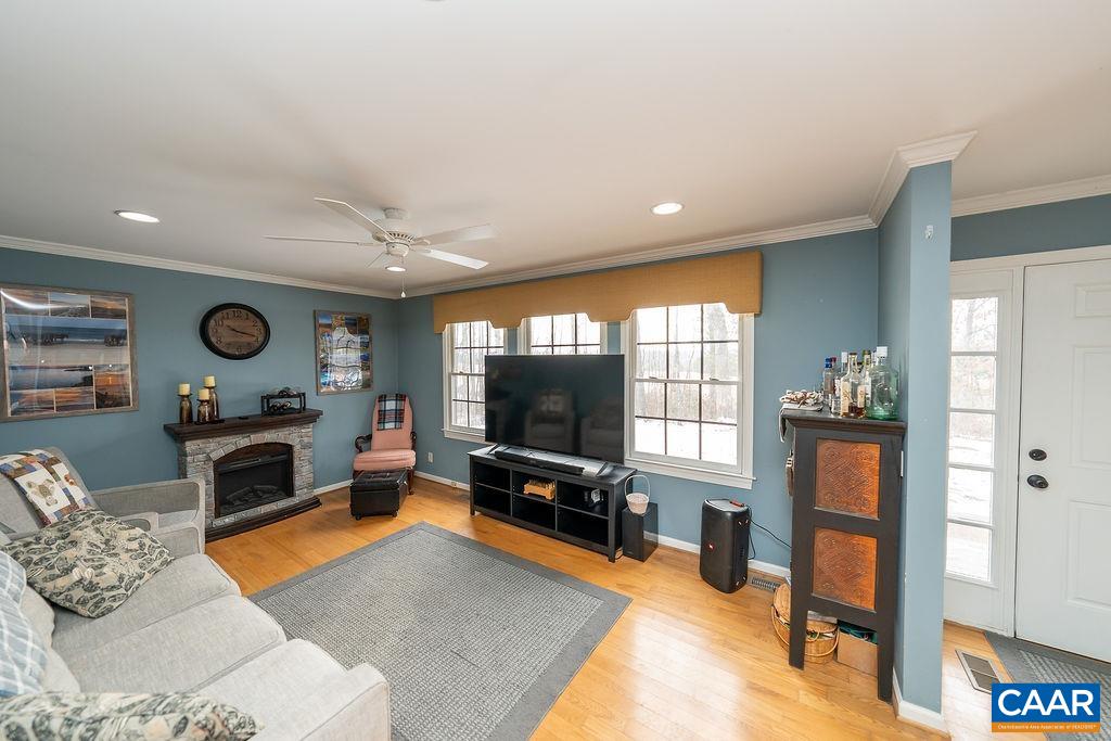 1425 Jacks Shop Road Rochelle, VA 22738 - Photo 10 of 66 a living room with furniture and a flat screen tv