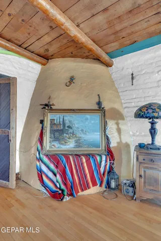 a bed room with furniture and a chandelier