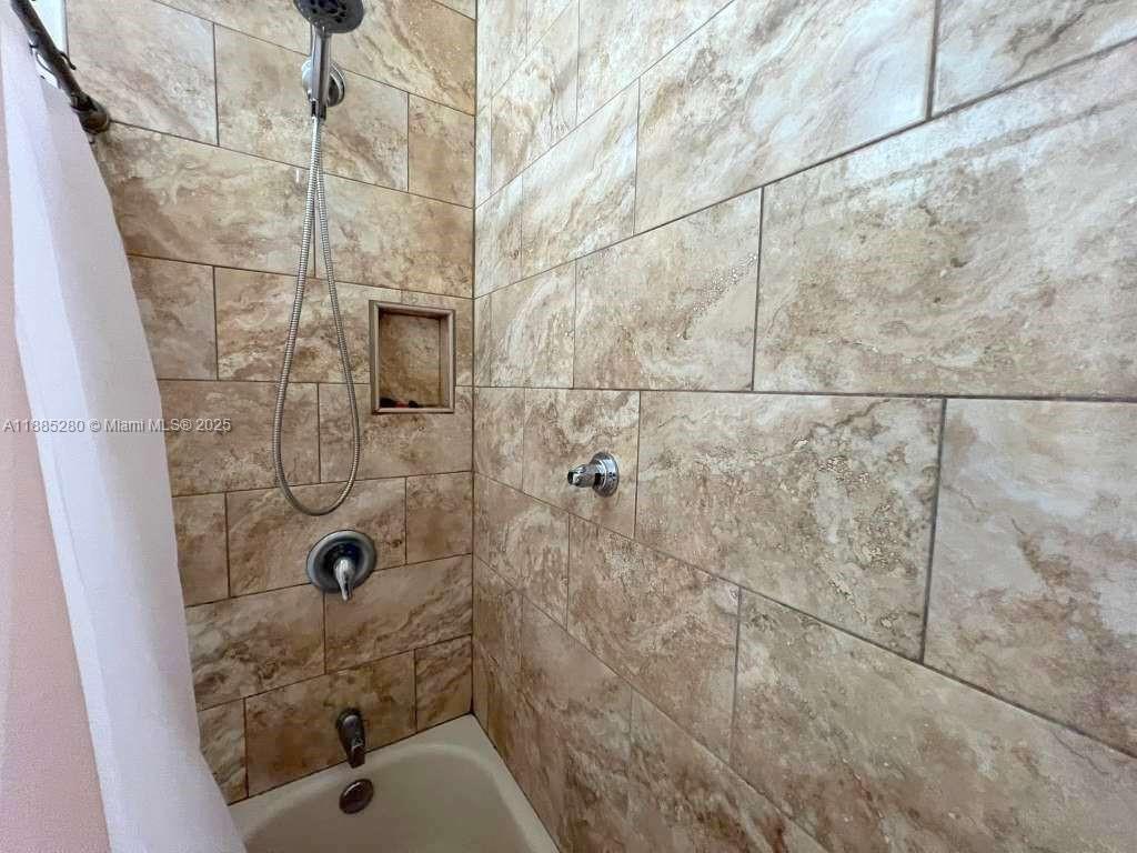 1130 Rutland Street Opa-Locka, FL 33054 - Photo 20 of 49 a bathroom with a shower