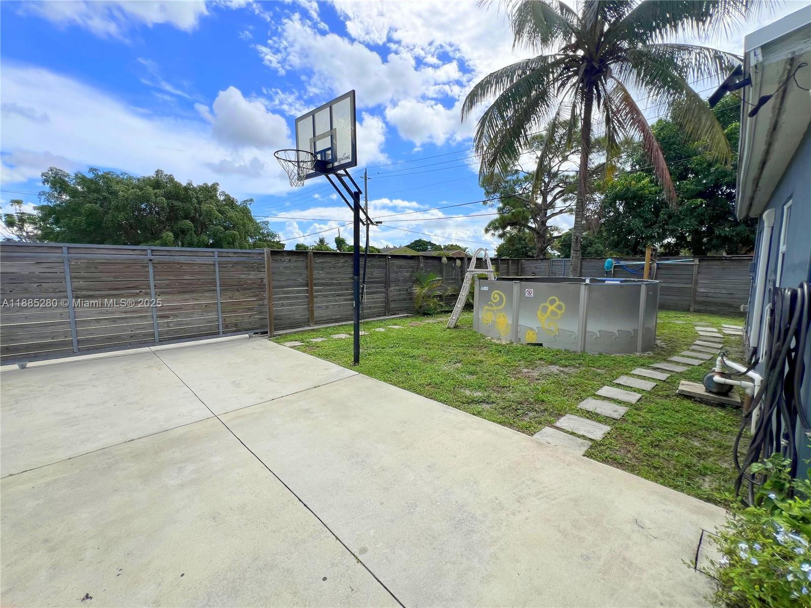 1130 Rutland Street Opa-Locka, FL 33054 - Photo 30 of 49 a view of a backyard