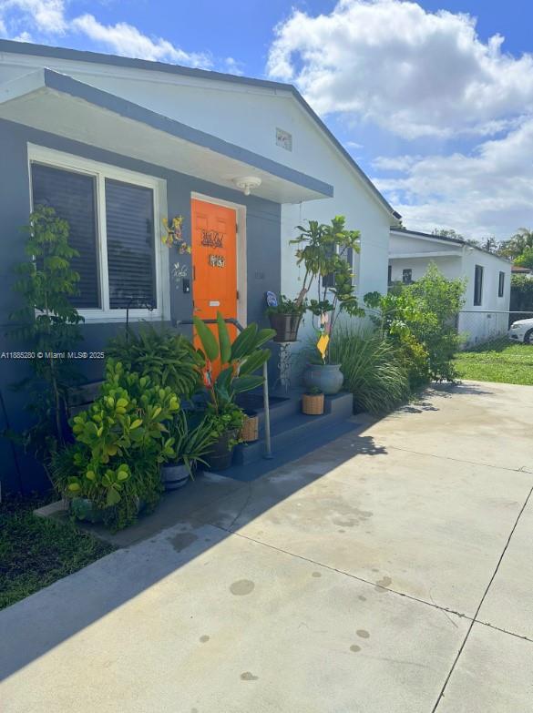 1130 Rutland Street Opa-Locka, FL 33054 - Photo 3 of 49 a view of a house with backyard and sitting area