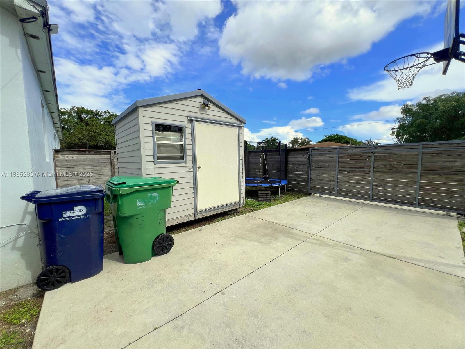 1130 Rutland Street Opa-Locka, FL 33054 - Photo 32 of 49 a view of a backyard