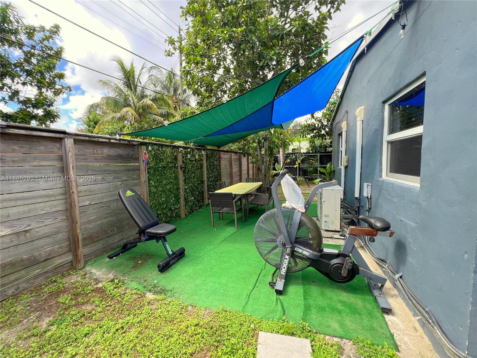1130 Rutland Street Opa-Locka, FL 33054 - Photo 45 of 49 a house view with a seating space