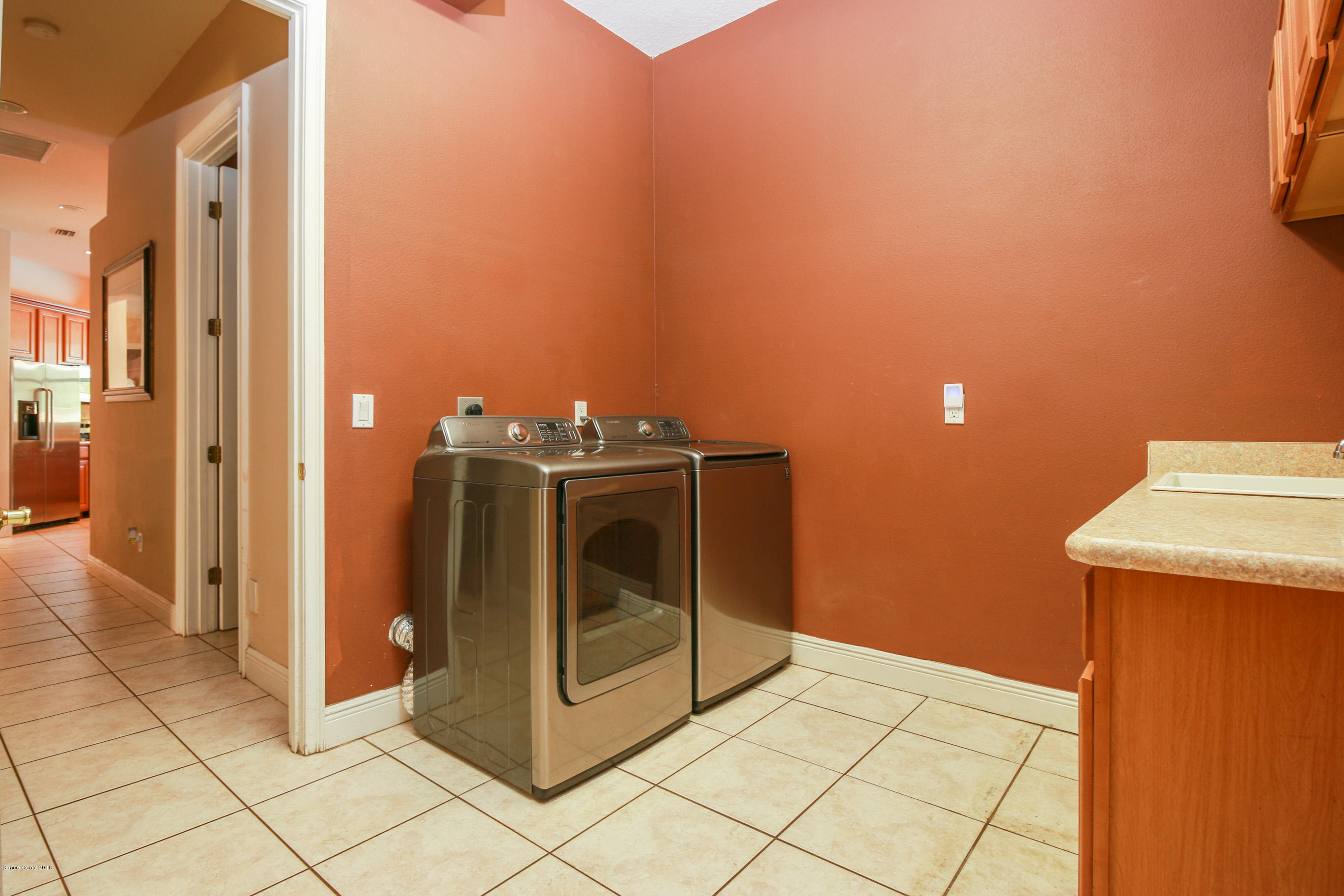 1237 Gerrity Street Southwest Palm Bay, FL 32908 - Photo 26 of 61 laundry