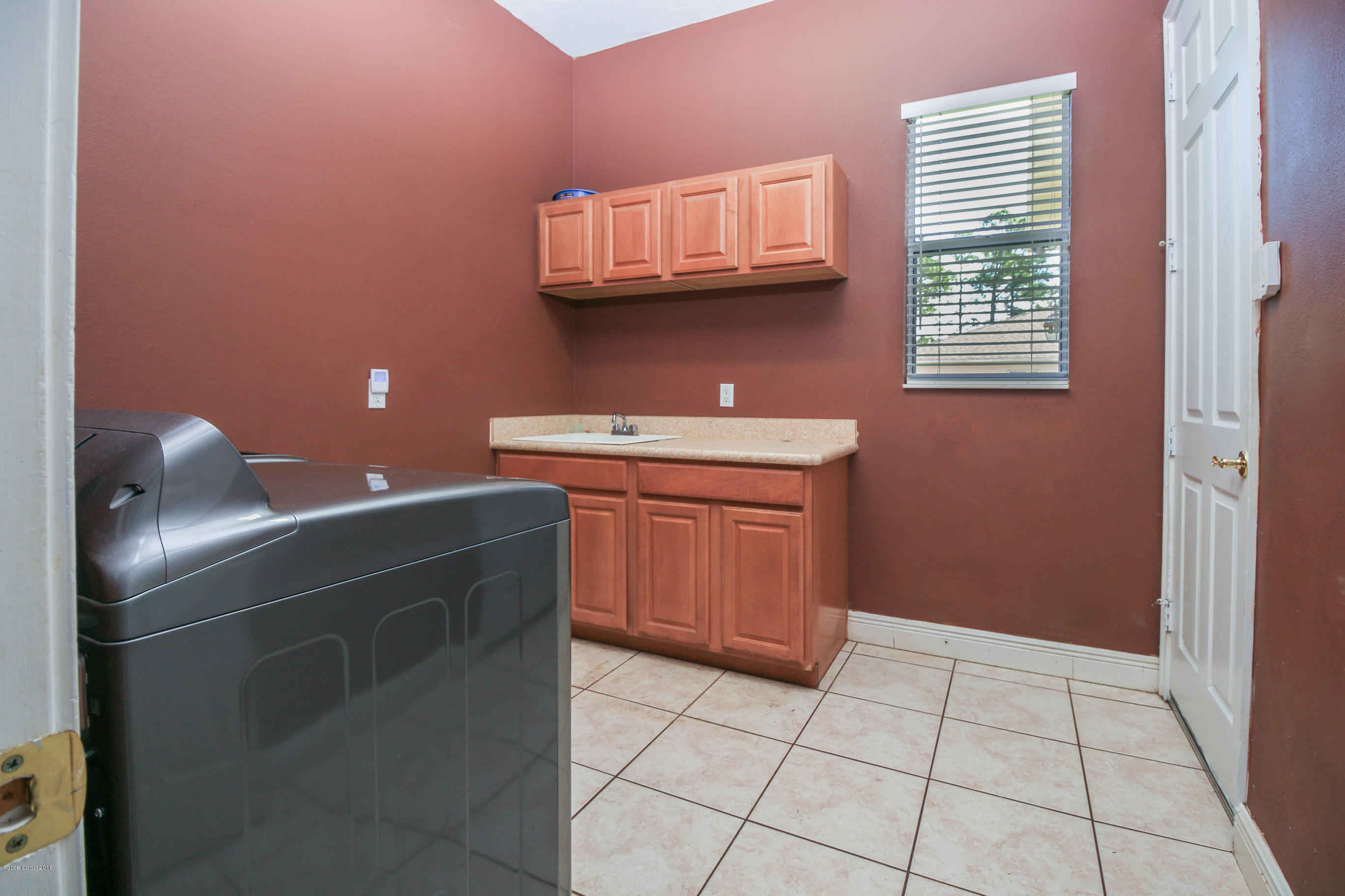 1237 Gerrity Street Southwest Palm Bay, FL 32908 - Photo 27 of 61 laundry2