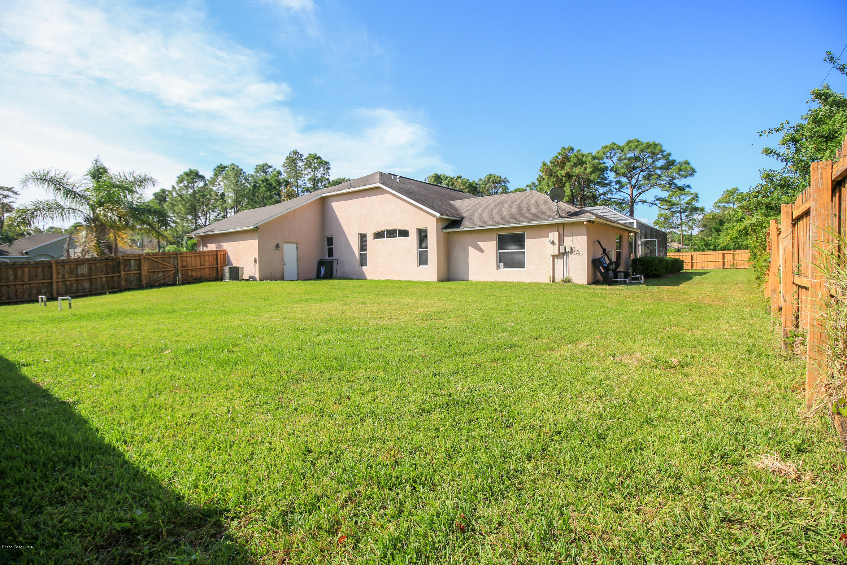 1237 Gerrity Street Southwest Palm Bay, FL 32908 - Photo 4 of 61 backyard