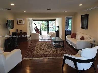 400 Southwest 14th Place Boca Raton, FL 33432 - Photo 4 of 29 a living room with furniture and a rug